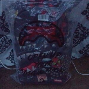 Sprayground Red and Black Backpack